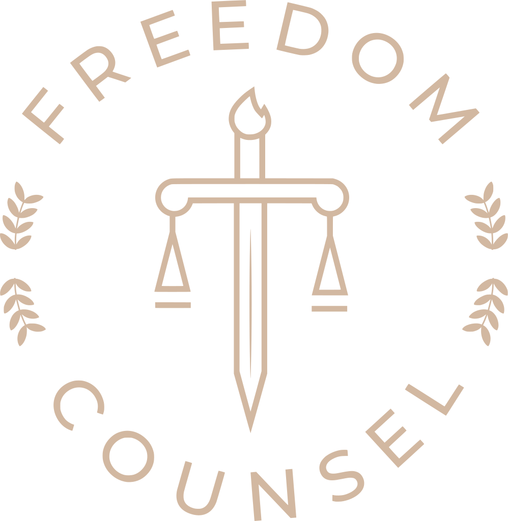 Freedom Counsel original logo: sword, torch, scales of justice and laurels